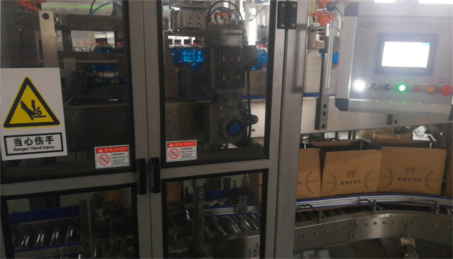 Drop type carton packer machine